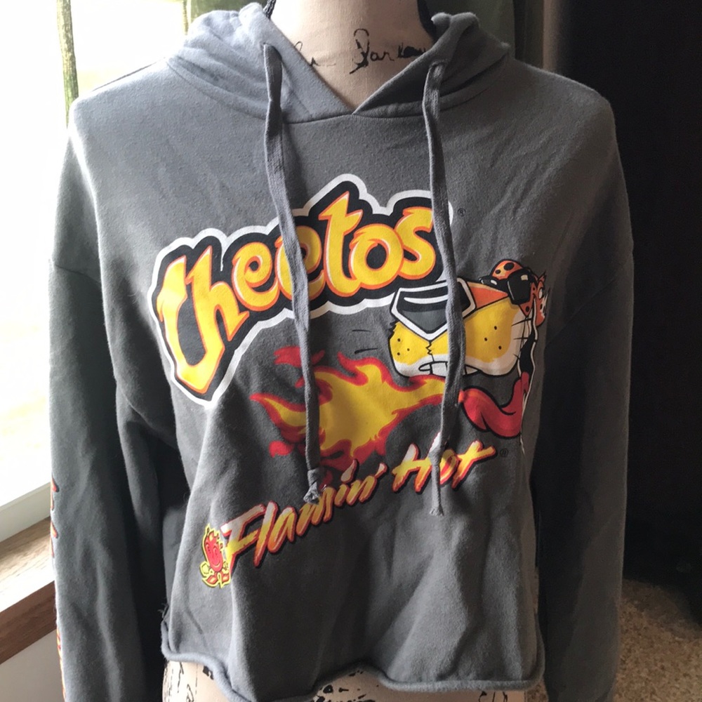 Large crop sweatshirt with Flamin’ Hot Cheetos.